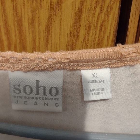 A Peach colored light sweater over a white blouse, size XL. - Picture 3 of 3